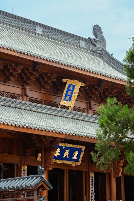 Intricate dougong timber brackets under the eaves of a traditional Chinese building